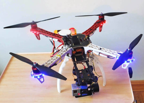 istock Quadcopter quad copter drone propeller props action camera lights 1819643992