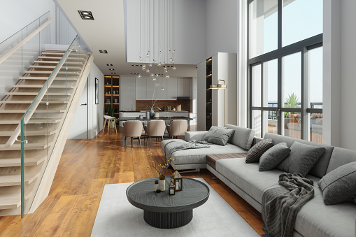 Modern Living Room With Corner Sofa, Open Plan Kitchen, Staircase And Pendant Light