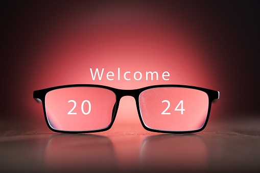 front view of the eyeglasses  with text welcome 2024