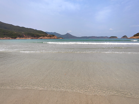 Shore at the Beautiful Sai Wan beach in Tai Long Wan bay, Sai Kung peninsula, Hong Kong.