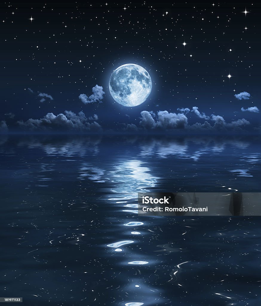 super moon and clouds in the night on sea sky dream of a calm sea and clear Sea Stock Photo