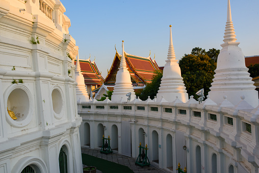 Vientiane, Laos.\nThe Patuxay is 45 meters high and 24 meters wide. It is located in the center of Vientiane, near the Prime Minister's Office. Construction began in 1960 and was largely completed in 1969. It looks like the Arc de Triomphe in Paris, France, from a distance, but on the base of its arch are typical Lao temple carvings and decorations, exquisite carvings full of Buddhist colors, showing the traditional national culture and art of Laos.\nThe Lao Prime Minister's Office is located next to the Arch of Triumph, and its architectural style is highly characteristic of Lao nationality