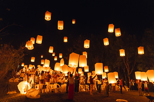 Floating lanterns at Yi Peng Festival in Chiang Mai,Lanterns, forming in the heart shape, were floating in the sky