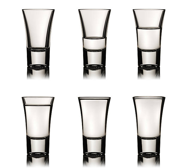 Six vodka glasses stock photo