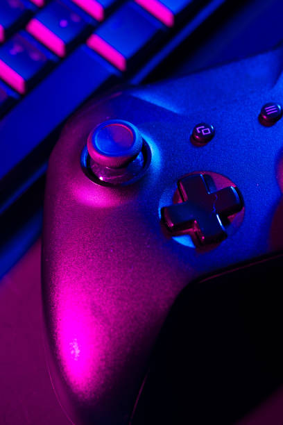 istock Computer keyboard and joystick on black background close up 1819812800