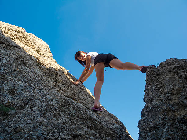 istock Young woman climbing 181982793