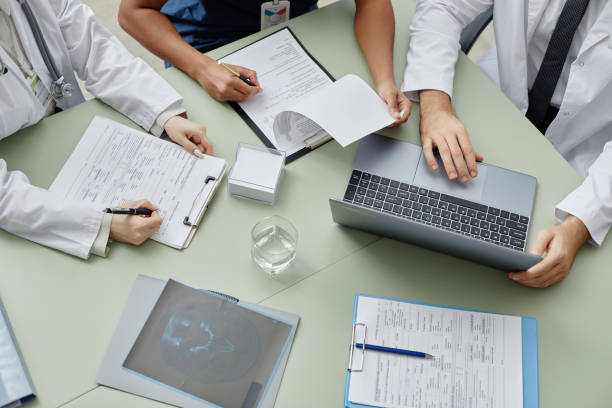 istock Top View Doctors Meeting at Table in Clinic 1819837133