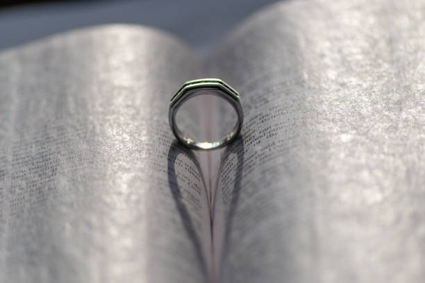 istock Arranging a book and a ring together forms a flawless heart shape 1819857368