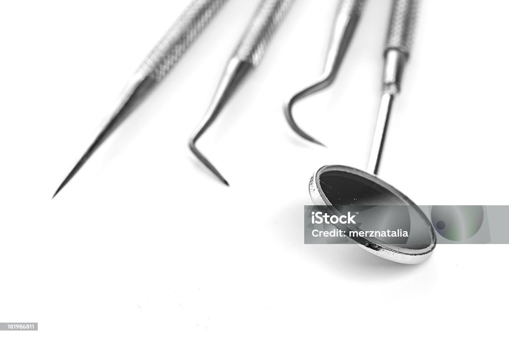 Ferramentas básicas de dentista isoladas no branco - Royalty-free Bardana-menor Foto de stock