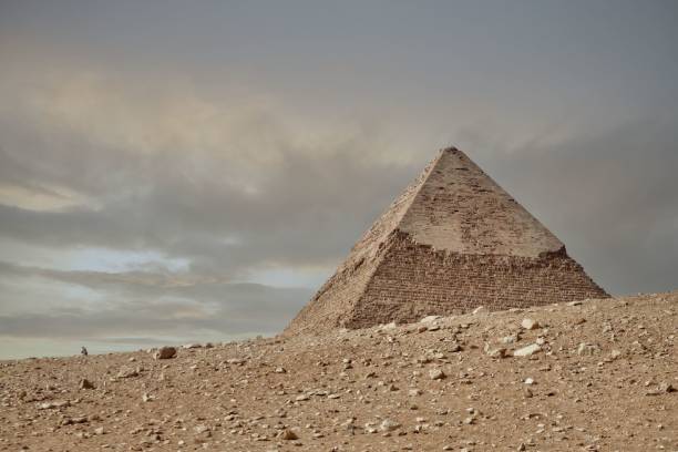 istock Close view of a pyramid in Egypt on a stormy day. 1819873831