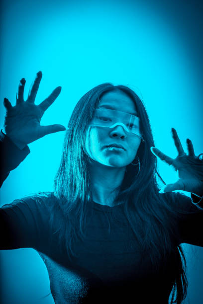 istock Cyber chinese woman gesturing in a metaverse space 1819892039