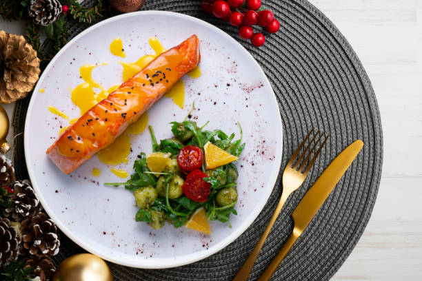 istock Grilled salmon with orange sauce and a salad. Typical Mediterranean coast dish. 1819896767