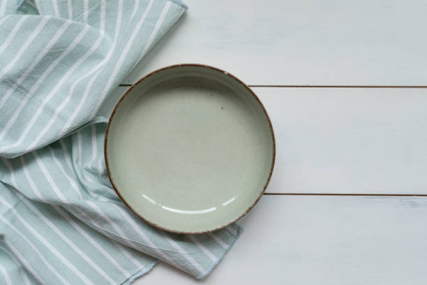 istock Empty plate and napkin on wooden 1819915206