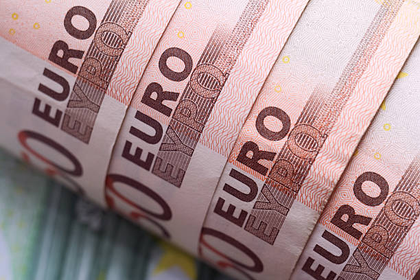 The twisted banknotes on 50 euros. stock photo