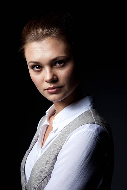 istock girl on isolated black background 181992505
