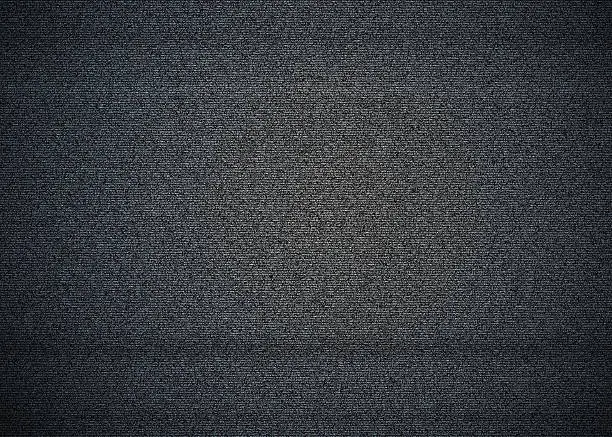 Black and white noise on a TV sreen with no signal, also called TV snow.