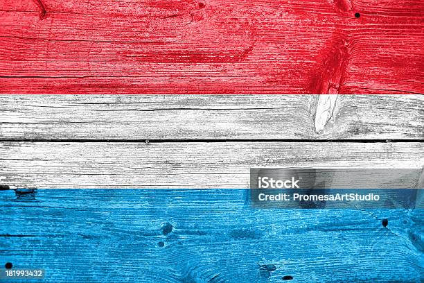 Luxembourg Flag Painted On Old Wood Plank Background Stock Photo - Download Image Now