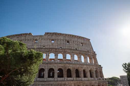 Exterior Panorama of the Roman Colosseum on a sunny day in Rome, Italy.