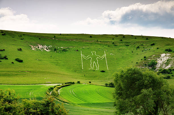 Long Man of Wilmington, a historic chalk cut  figure on a hillside in East Sussex, England