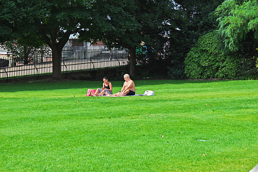 Hampton court, UK - 08 Aug 2013: Some people in Hampton Court, England, UK