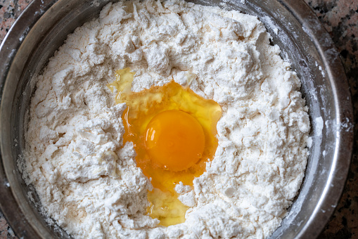 Flour and egg in close-up