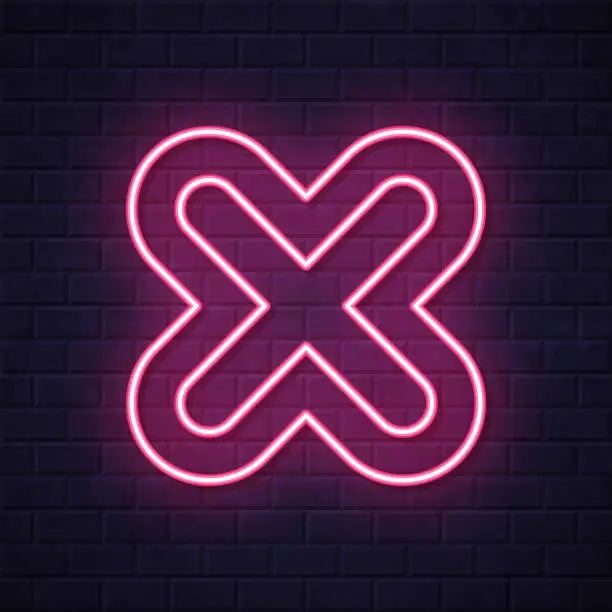Vector illustration of Cross mark. Glowing neon icon on brick wall background