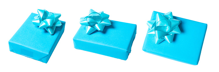 Light blue gift with bow ribbon, isolated on white or transparent background cutout.