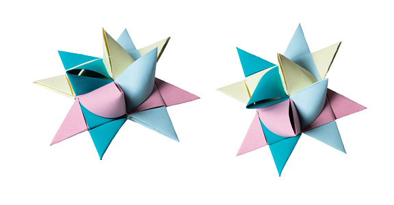 Pink, blue and yellow Origami Star, isolated on white or transparent background cutout.
