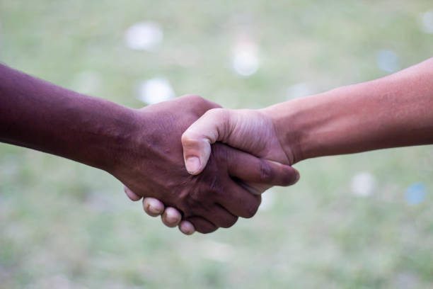 istock A man handshake with another man hand and blurred background 1820019235