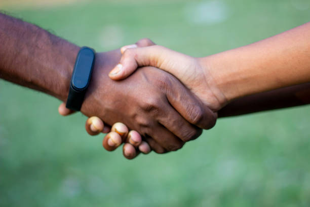 istock A man handshake with another man and blurred background 1820020317