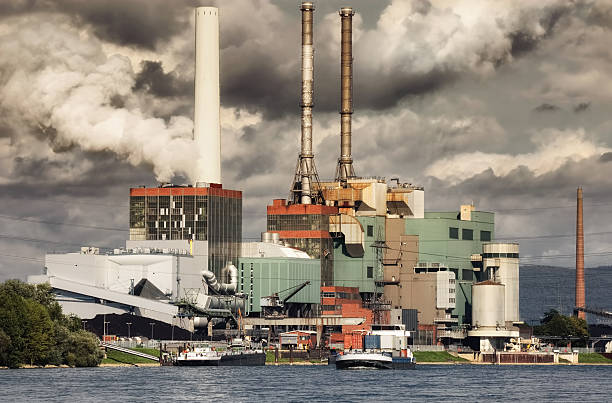 istock Large power plant and smoky looking sky 182003086