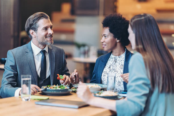 istock Business people having lunch together in a restaurant 1820046310