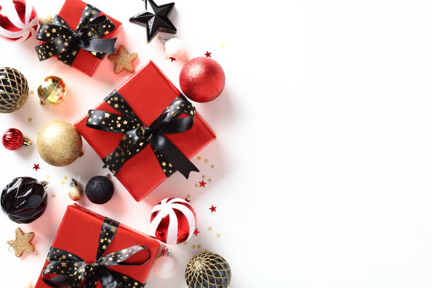 istock Festive Christmas background with red gift boxes, vintage baubles, decorations on white table. Flat lay, top view, copy space. 1820046488
