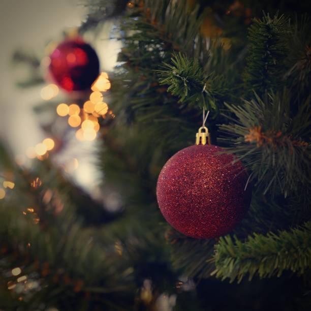 istock Christmas background. Beautiful colorful decorations on the Christmas tree with lights. Abstract concept for holidays and winter time. 1820078817