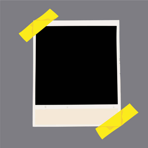 Empty instant photo frame fixed with yellow adhesive tape. Vector illustration Empty instant photo frame fixed with yellow adhesive tape. Vector illustration polaroid mockup stock illustrations
