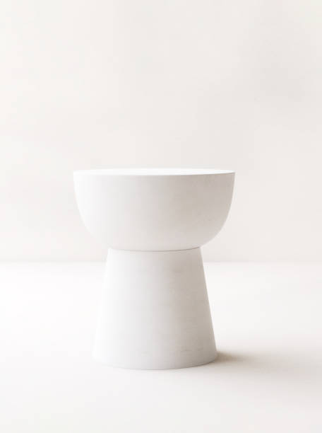 istock Modern white side table podium with texture in sunlight on beige white room background 1820083598
