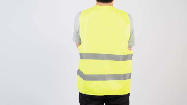 istock Man wear Safety Vest and turn back on white background. 1820098974