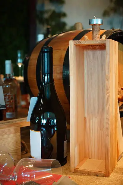 Wooden box for wine bottles and wine.