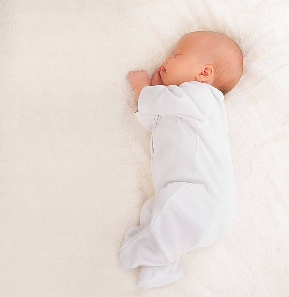 istock newborn baby sleeps 182013866