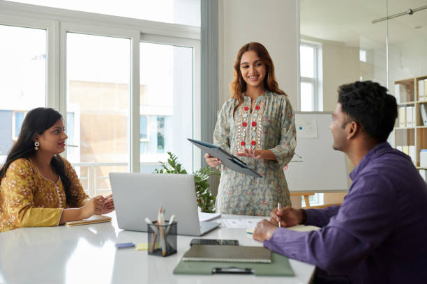Entrepreneur Taking in front of Colleagues