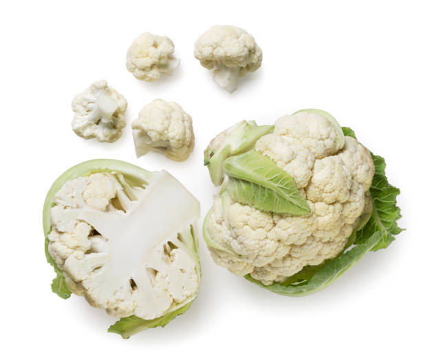 istock Cauliflower, half and pieces on a white background. Top view 1820151961