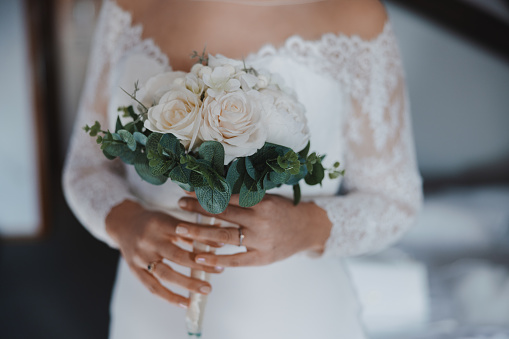 Close Up Of A Bride Holding Bouquet