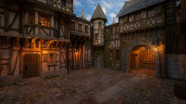 istock Fantasy medieval town courtyard with cobblestone street, lit by lanterns at dusk. 3D rendering. 1820191921