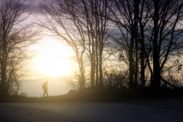 Woman silhouette on langhe Italian Countryside