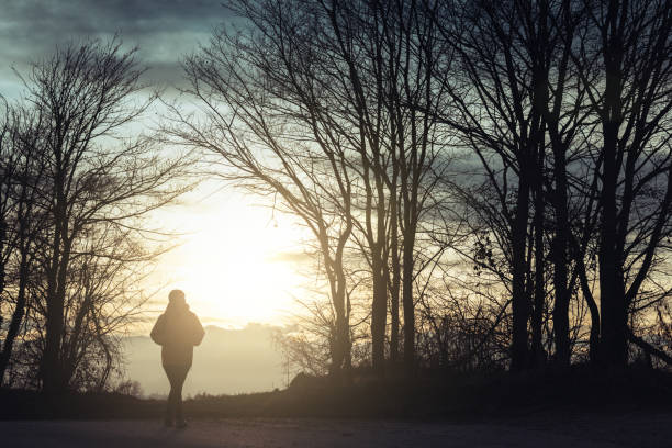 istock Woman silhouette on langhe Italian Countryside 1820192995