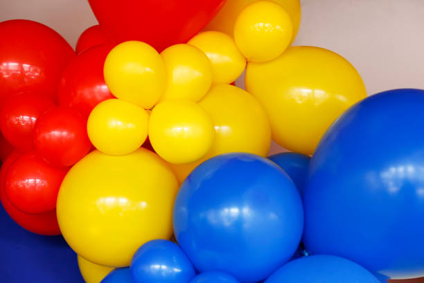 istock diverse and colorful balloons backdrop - birthday party 1820205131
