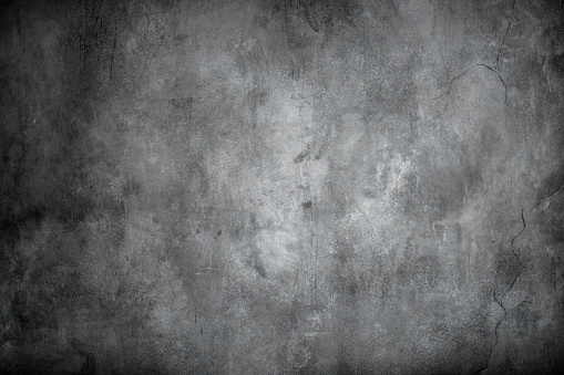 Aged concrete wall texture. Dark grunge background