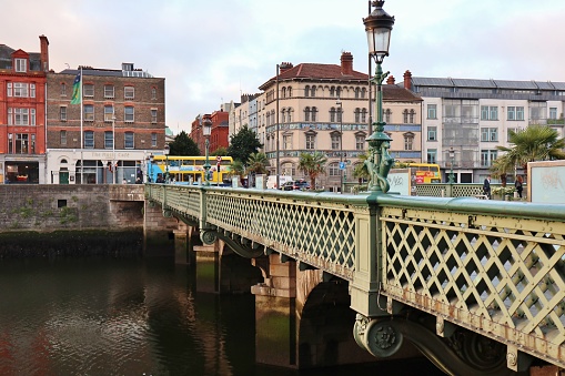 Dublin, Ireland – September 20, 2021: Grattan Bridge over the River Liffey from Liffey Boardwalk