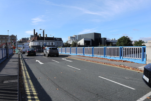 Dublin, Ireland – September 20, 2021: 19th century Rory O'More Bridge over the River Liffey