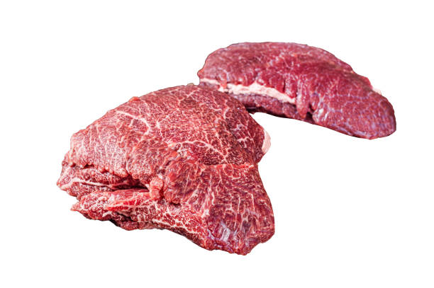 istock Raw Beef cheeks, fresh veal meat on butcher cleaver. Isolated, white background. 1820229984
